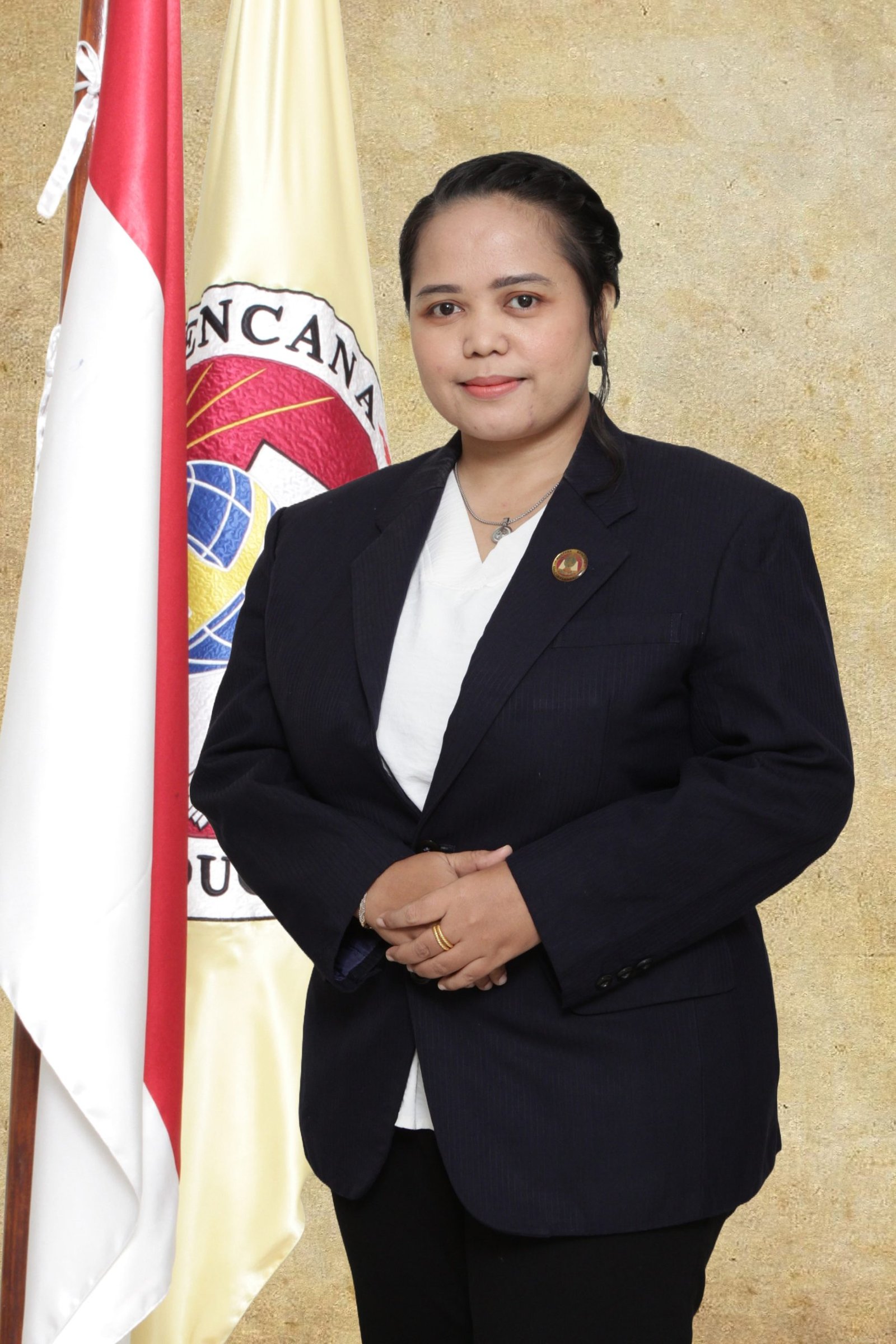 Arlince Silitonga, S.Pd